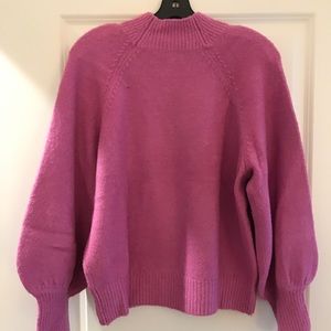 Pink sweater...